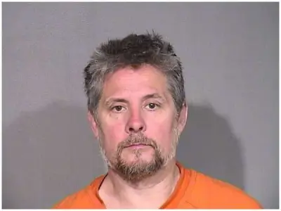 Authorities say man threatened people at Island Lake bar, hit patron with shotgun