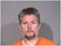 Authorities say man threatened people at Island Lake bar, hit patron with shotgun